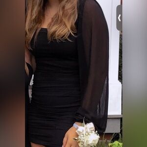 A black mini dress, worn to one dance. Great simple dress.